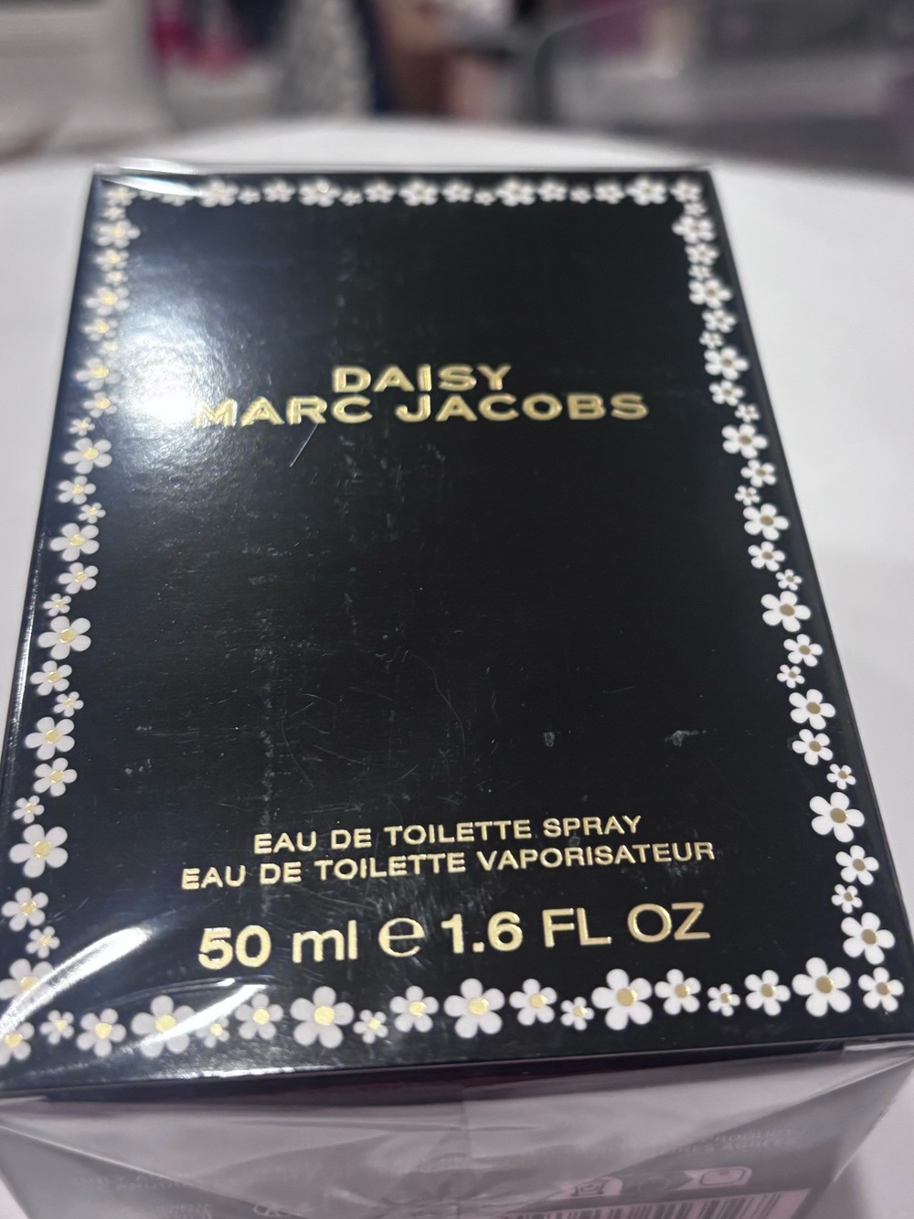 Marc Jacobs Black Box with White Daisy Border and Gold Lettering